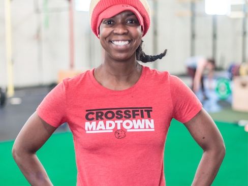 Coach Keysha smiling in the gym