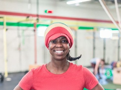 Coach Keysha smiling in the gym